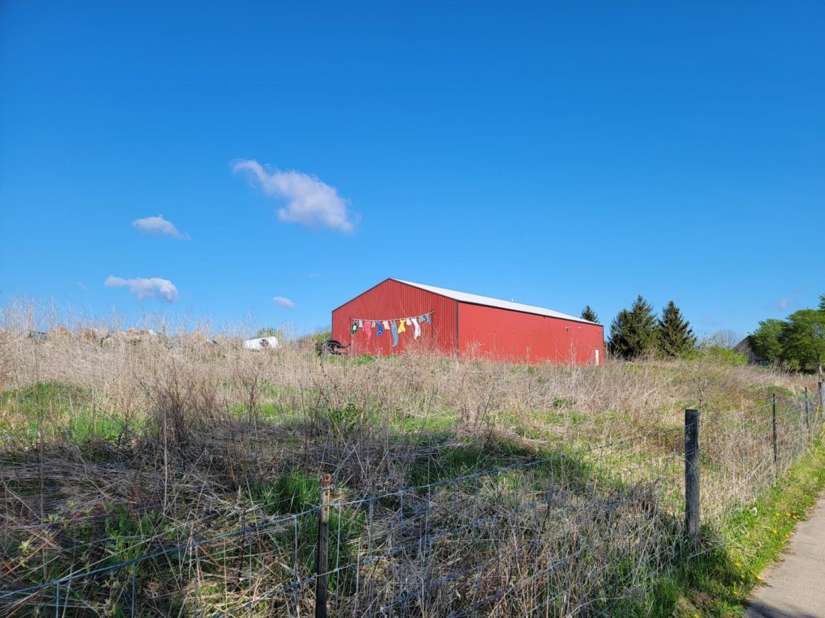 Here's a barn with some clouds and blue sky.